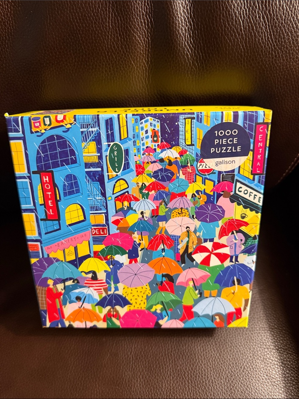 Galison Umbrella Lane. 1000 pieces. Has poster. Like new.